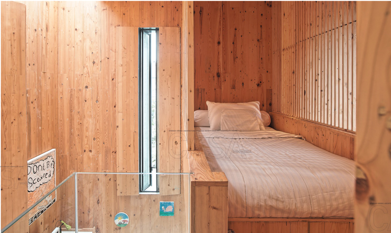 desain kamar tidur rumah palem bernuansa kayu